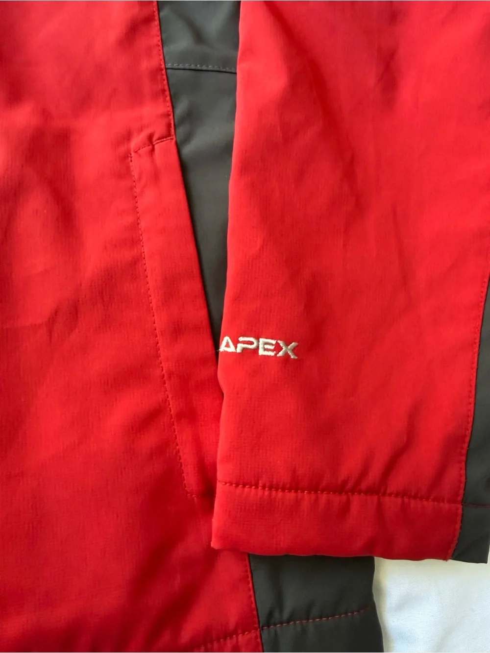 The North Face Kids Red and Black Softshell Rain Jacket